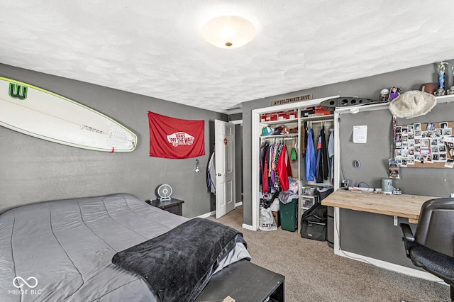 carpeted bedroom with a closet