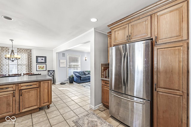 kitchen featuring stainless steel fridge, ornamental molding, light tile patterned floors, a chandelier, and pendant lighting