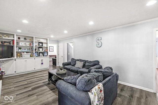 living room with dark wood-type flooring and crown molding