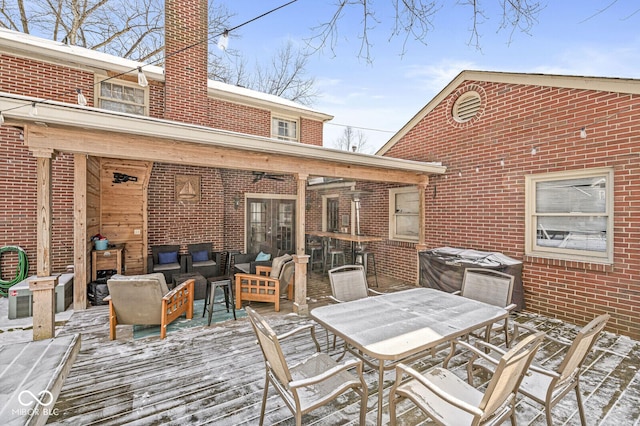 wooden deck with an outdoor hangout area