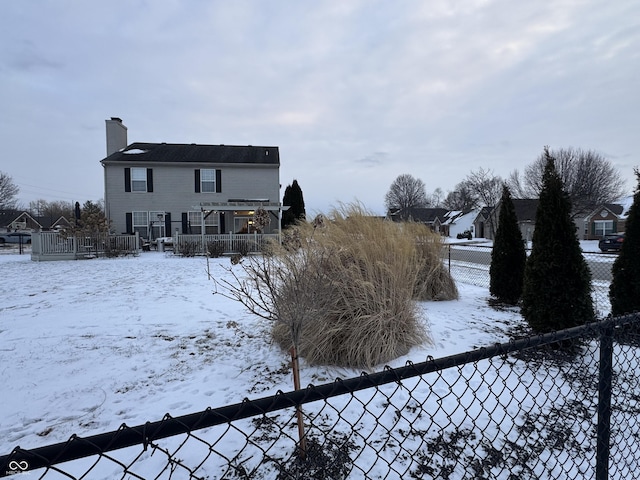 view of yard covered in snow