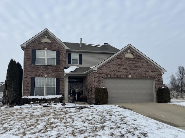 front of property with a garage