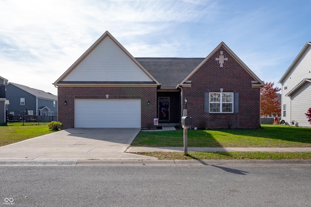 view of front facade with a garage and a front yard