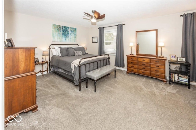 bedroom featuring a ceiling fan and carpet floors