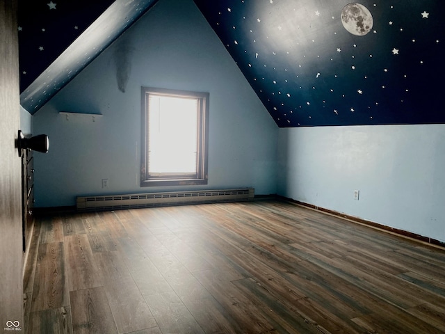 600 N Meridian St, Brazil, IN 47834 - additional living space featuring baseboard heating, wood finished floors, and lofted ceiling