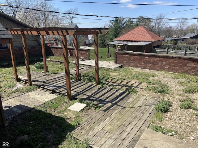 600 N Meridian St, Brazil, IN 47834 - fenced backyard featuring a deck and a pergola