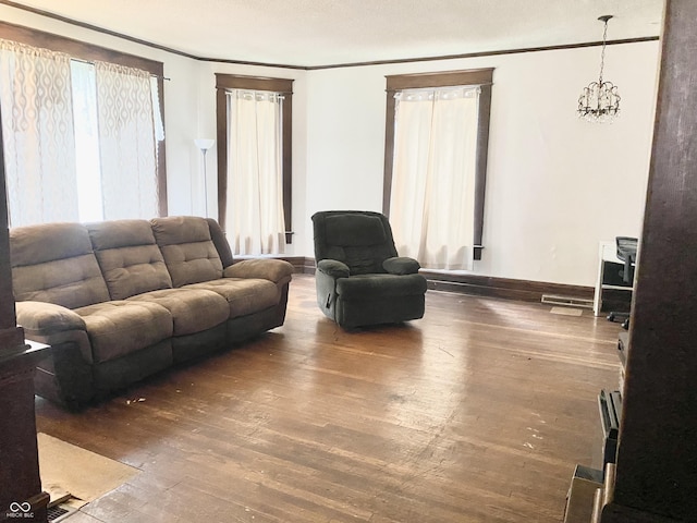 600 N Meridian St, Brazil, IN 47834 - living room with ornamental molding, hardwood / wood-style floors, and baseboards