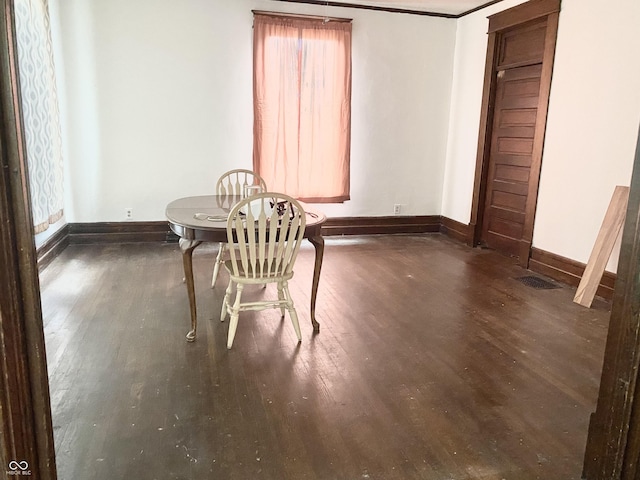 600 N Meridian St, Brazil, IN 47834 - unfurnished dining area featuring wood finished floors and baseboards