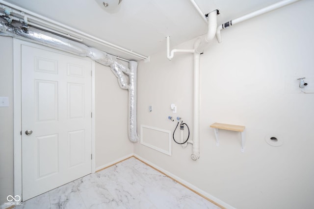 bathroom with marble finish floor and baseboards