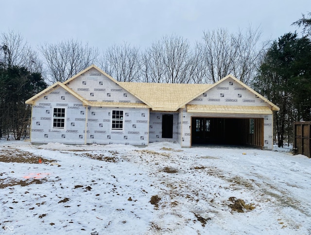 property in mid-construction featuring an attached garage