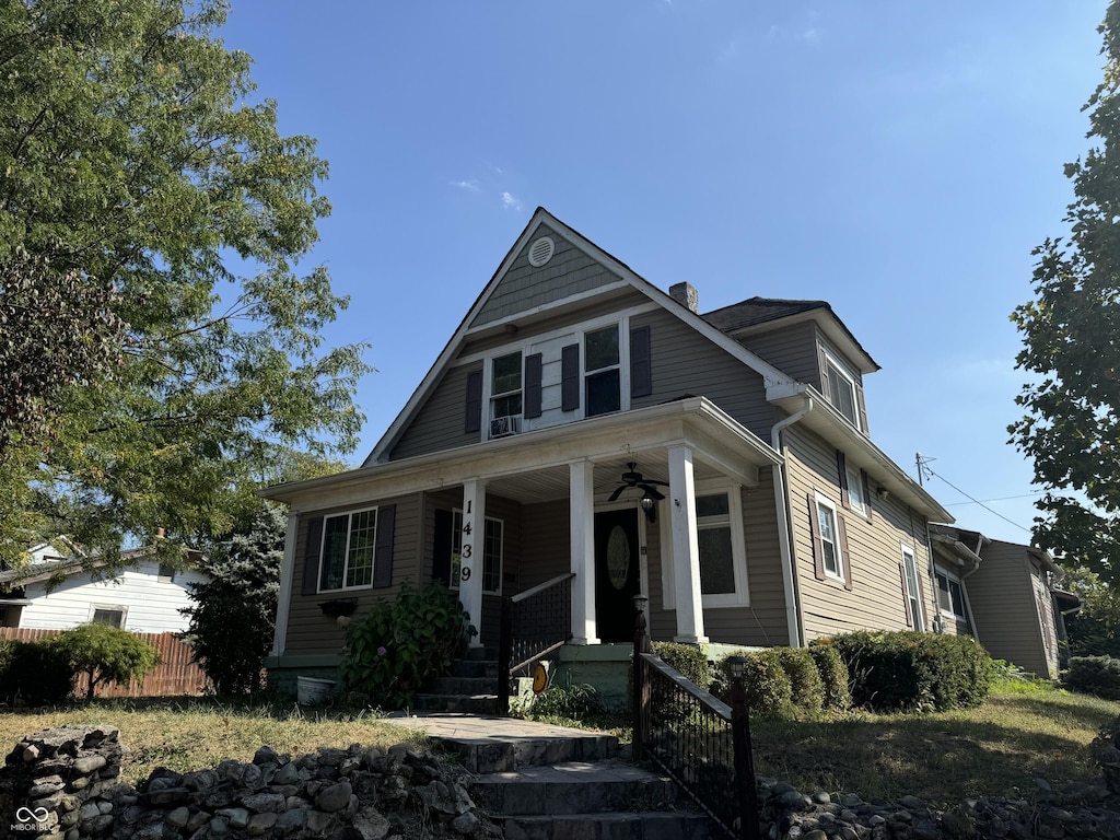 view of front of house with ceiling fan