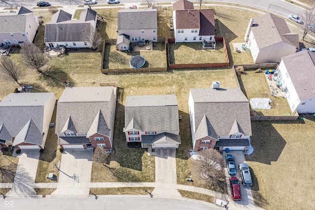 birds eye view of property with a residential view