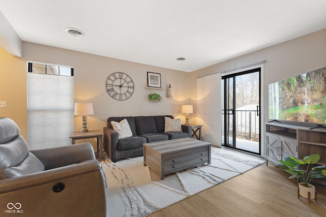 living room featuring light wood-type flooring