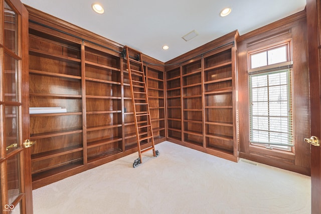 interior space with carpet flooring and recessed lighting