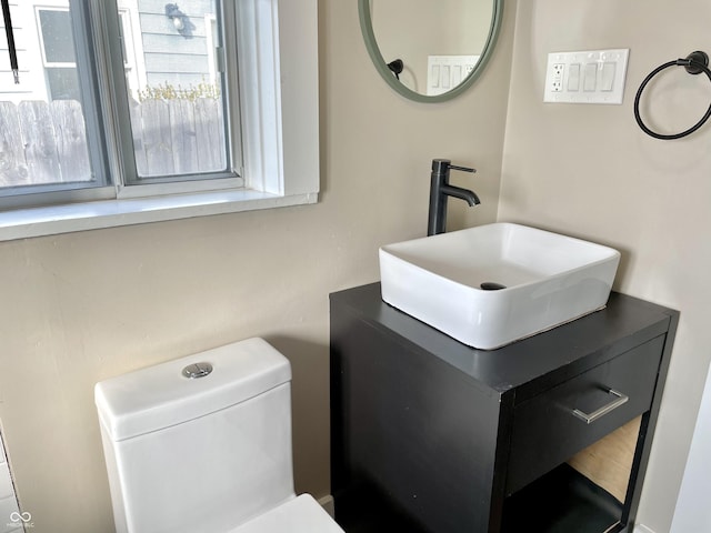 bathroom with vanity and toilet