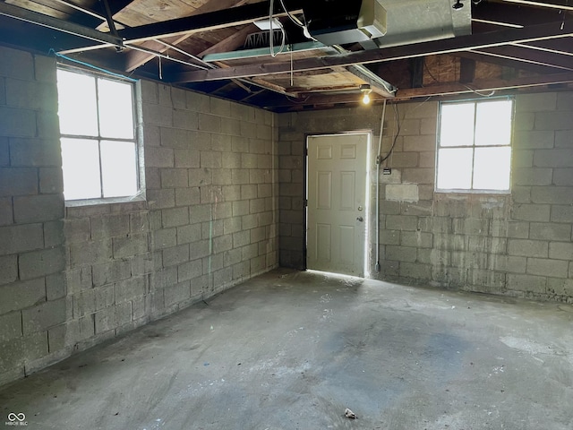 basement featuring concrete block wall