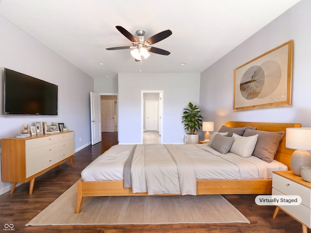 bedroom featuring ceiling fan and dark hardwood / wood-style floors