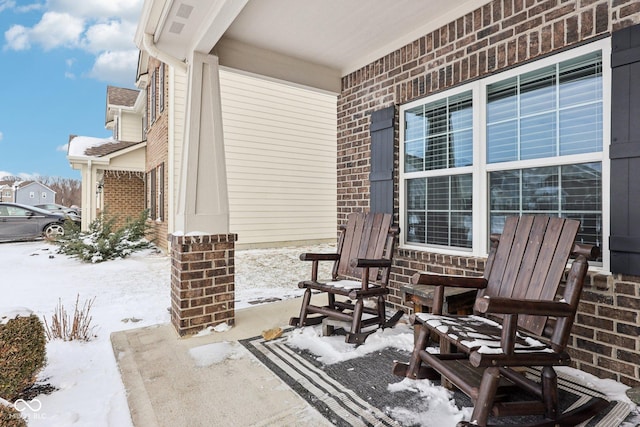 view of snow covered patio