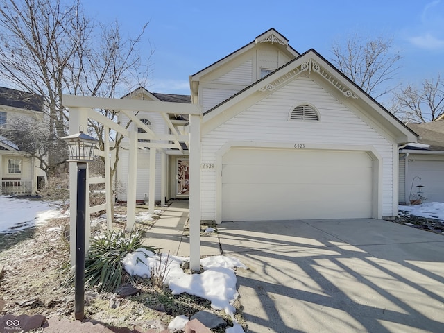 view of front of property featuring a garage and driveway