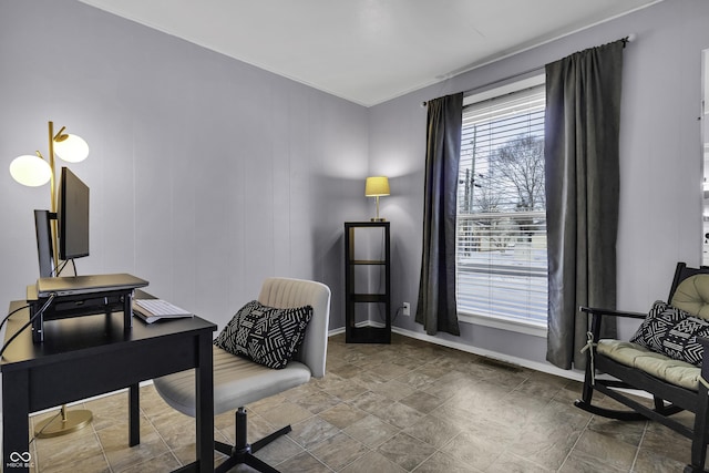 office area with baseboards and visible vents