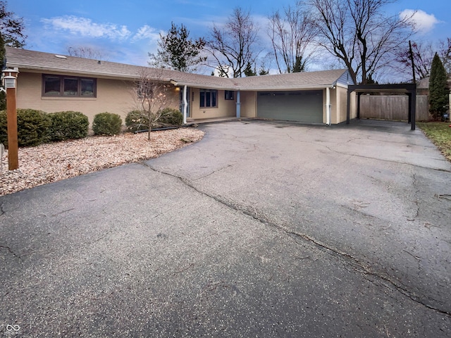 single story home featuring a garage