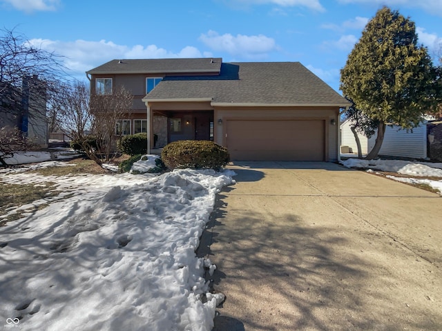 view of front of property with a garage