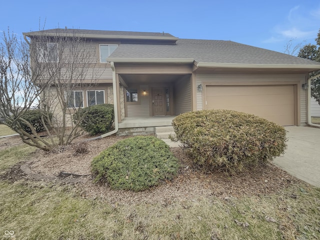 view of front facade featuring covered porch, concrete driveway, a garage, and a shingled roof