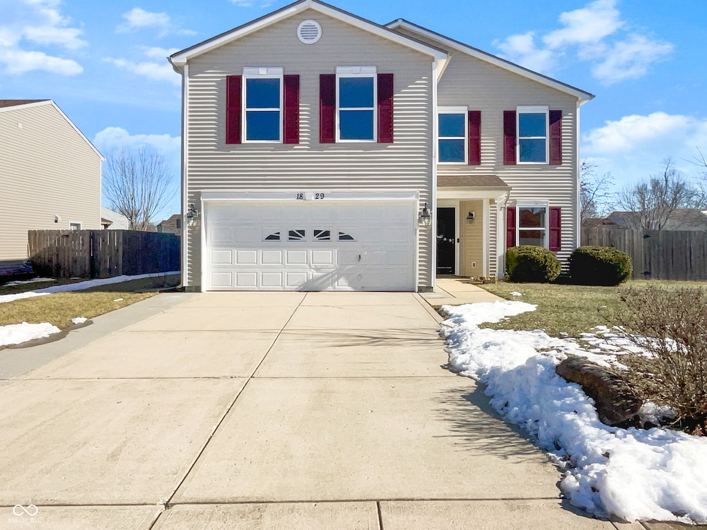 view of property with a garage