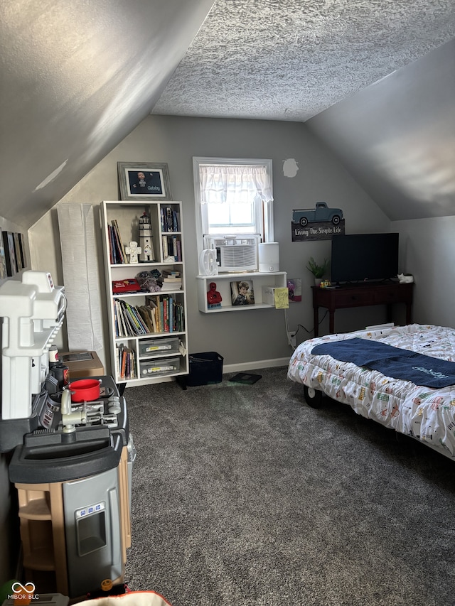 carpeted bedroom featuring a textured ceiling, vaulted ceiling, and cooling unit