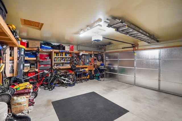 garage featuring a garage door opener