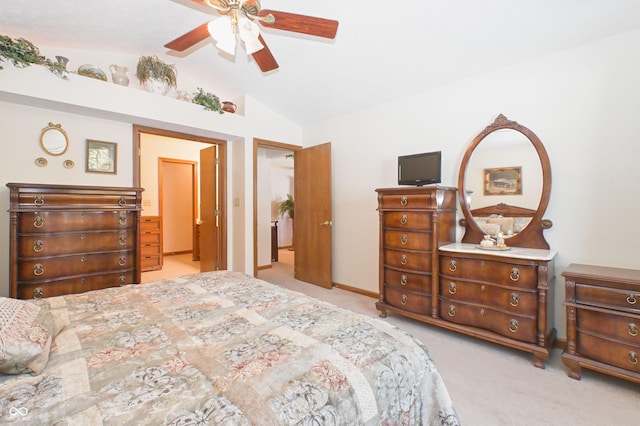 bedroom featuring carpet flooring, a ceiling fan, and lofted ceiling