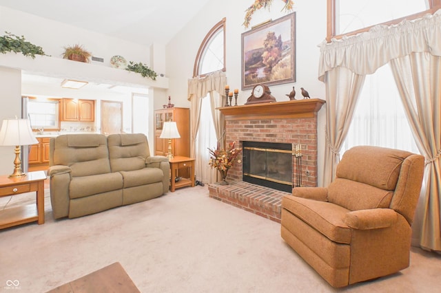 living room with a fireplace, high vaulted ceiling, and light carpet