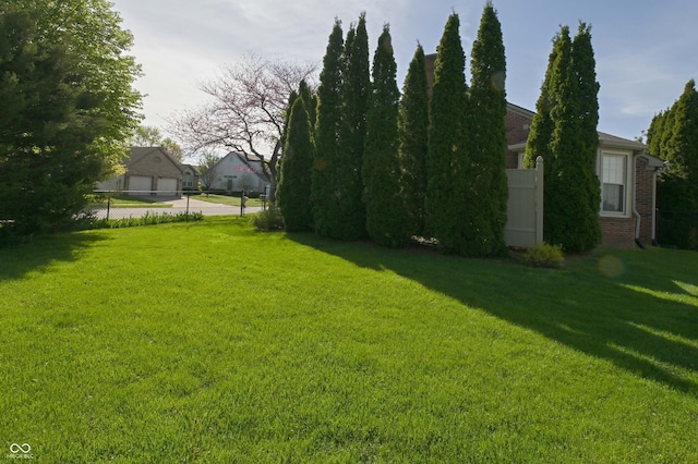 view of yard featuring fence