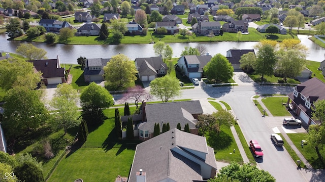 aerial view with a water view and a residential view