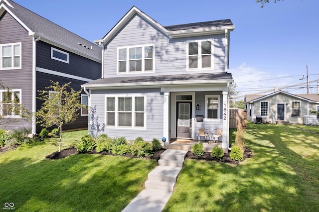 view of front of home featuring a front lawn