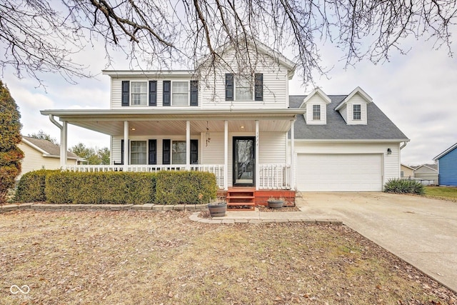 view of front of property featuring covered porch and a garage