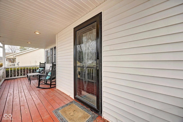 deck featuring covered porch