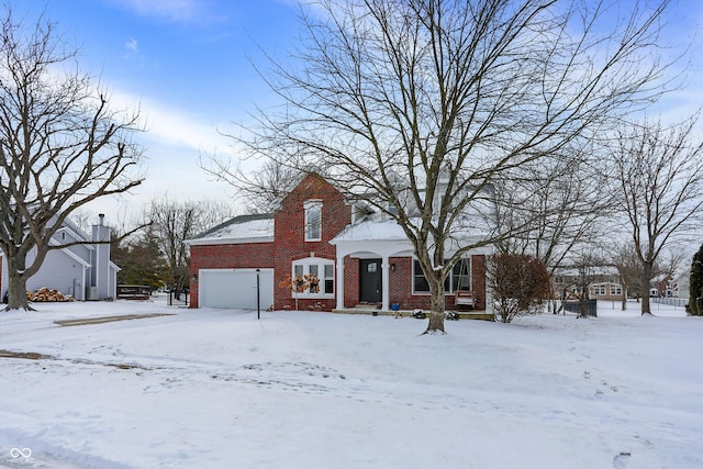 view of front of house featuring brick siding