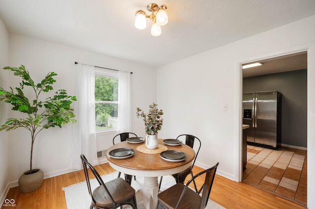 6865 Meadow View Dr, Lawrence, IN 46226 - dining area with light wood-style flooring