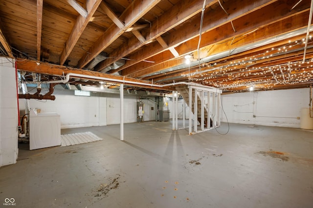 6865 Meadow View Dr, Lawrence, IN 46226 - unfinished below grade area featuring washer / clothes dryer, stairs, and water heater