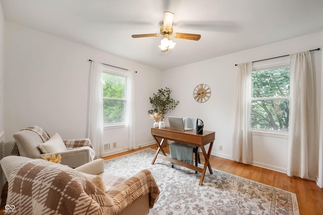 6865 Meadow View Dr, Lawrence, IN 46226 - office space with light wood-style flooring and a ceiling fan