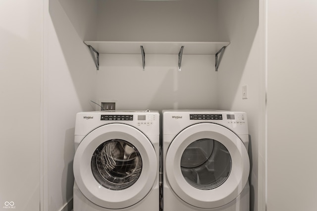 laundry area featuring laundry area and washing machine and clothes dryer