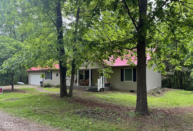 3174 W Sycamore Ln, Brazil, IN 47834 - view of front of home with a porch, an attached garage, a front lawn, and crawl space