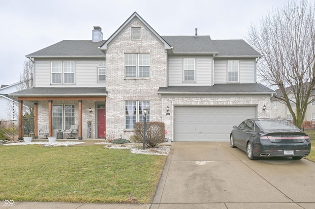 traditional home featuring brick siding, a chimney, covered porch, concrete driveway, and a front yard