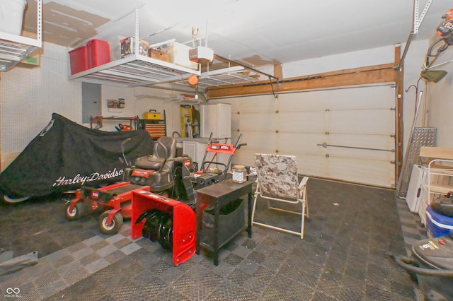 garage featuring a garage door opener