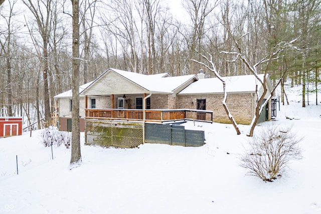 view of front of home featuring a chimney