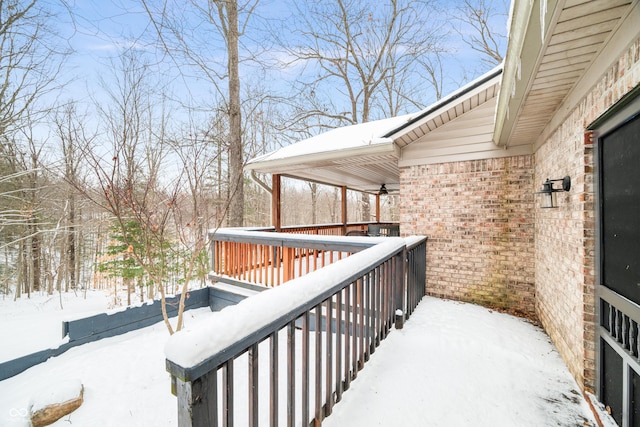 snow covered deck with ceiling fan