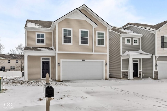 townhome / multi-family property featuring a garage