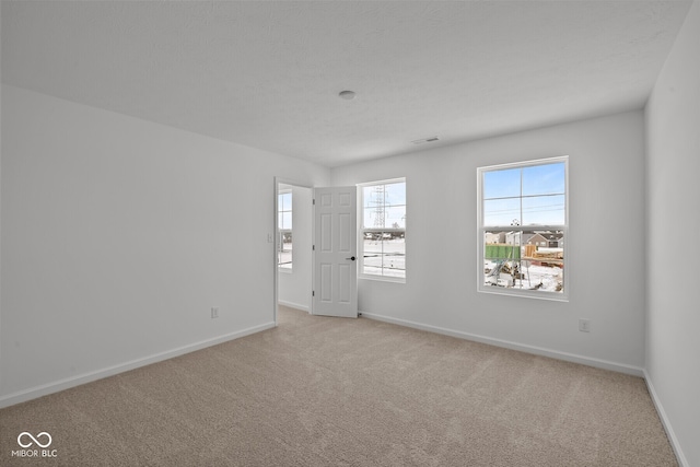 5119 Rolling Meadow Blvd, Indianapolis, IN 46237 - carpeted spare room featuring baseboards and visible vents