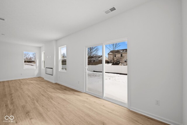 5119 Rolling Meadow Blvd, Indianapolis, IN 46237 - interior space with baseboards, visible vents, and light wood-style floors